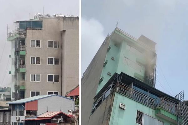 Cháy chung cư mini 9 tầng, nhiều người leo lên mái chờ giải cứu