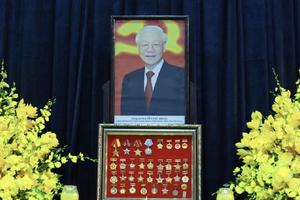 Lào để tang cấp quốc gia tưởng niệm Tổng Bí thư Nguyễn Phú Trọng