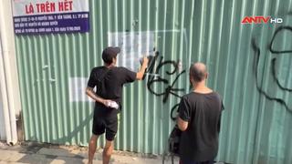 Trục xuất hai người nước ngoài vẽ bậy trên đường phố TP.HCM
