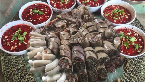 Căn bệnh nguy hiểm bắt nguồn từ món tiết canh