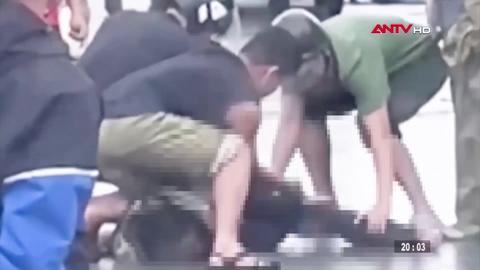 Tạm giữ hình sự đối tượng tấn công CSGT đang điều tiết xe cộ tránh lũ