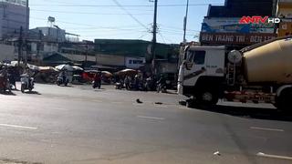 Va chạm giữa xe bồn và xe máy, hai người bị thương